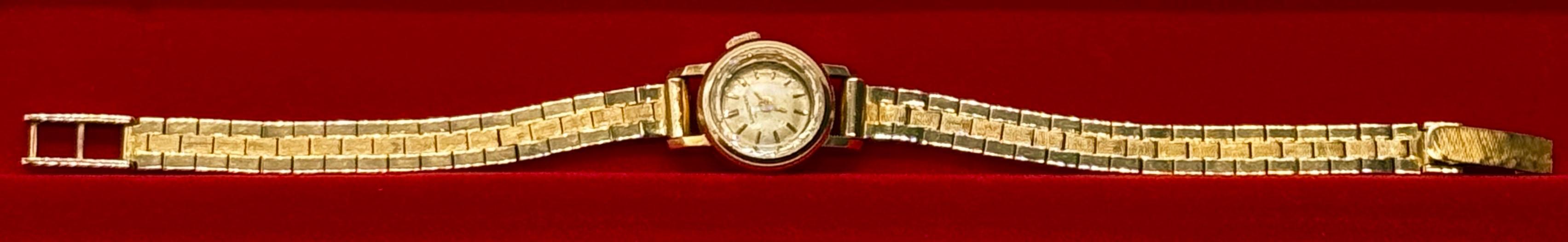 Złoty zegarek Longines ze złotą bransoletą, masa łączna 24 g