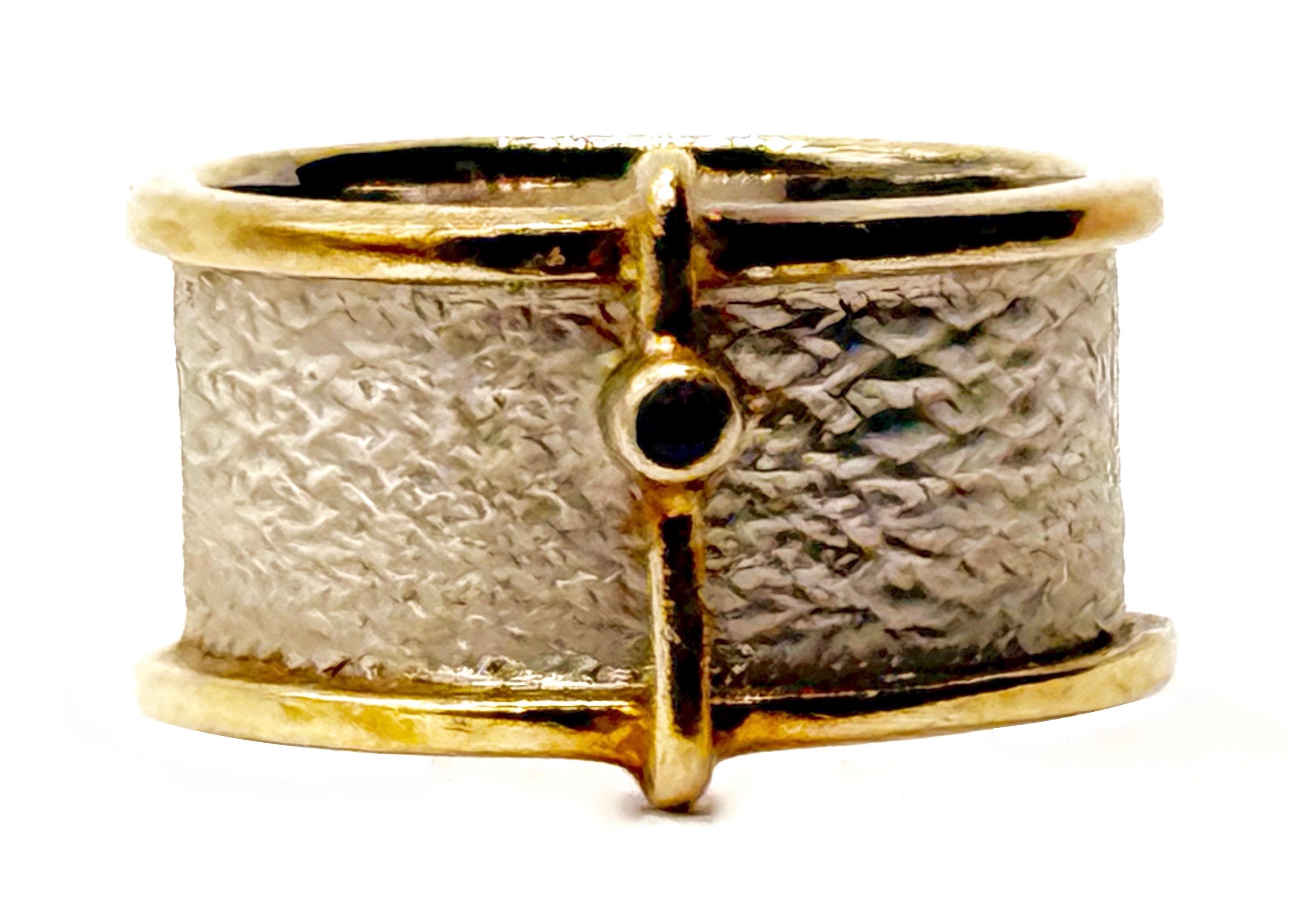 German Kabirski , srebrny pierścionek z szafirem