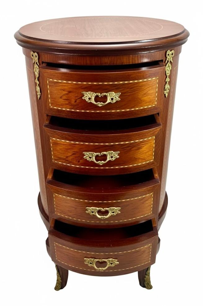 Okrągła komoda w stylu Ludwika XVI stojąca na 4 giętych nogach
