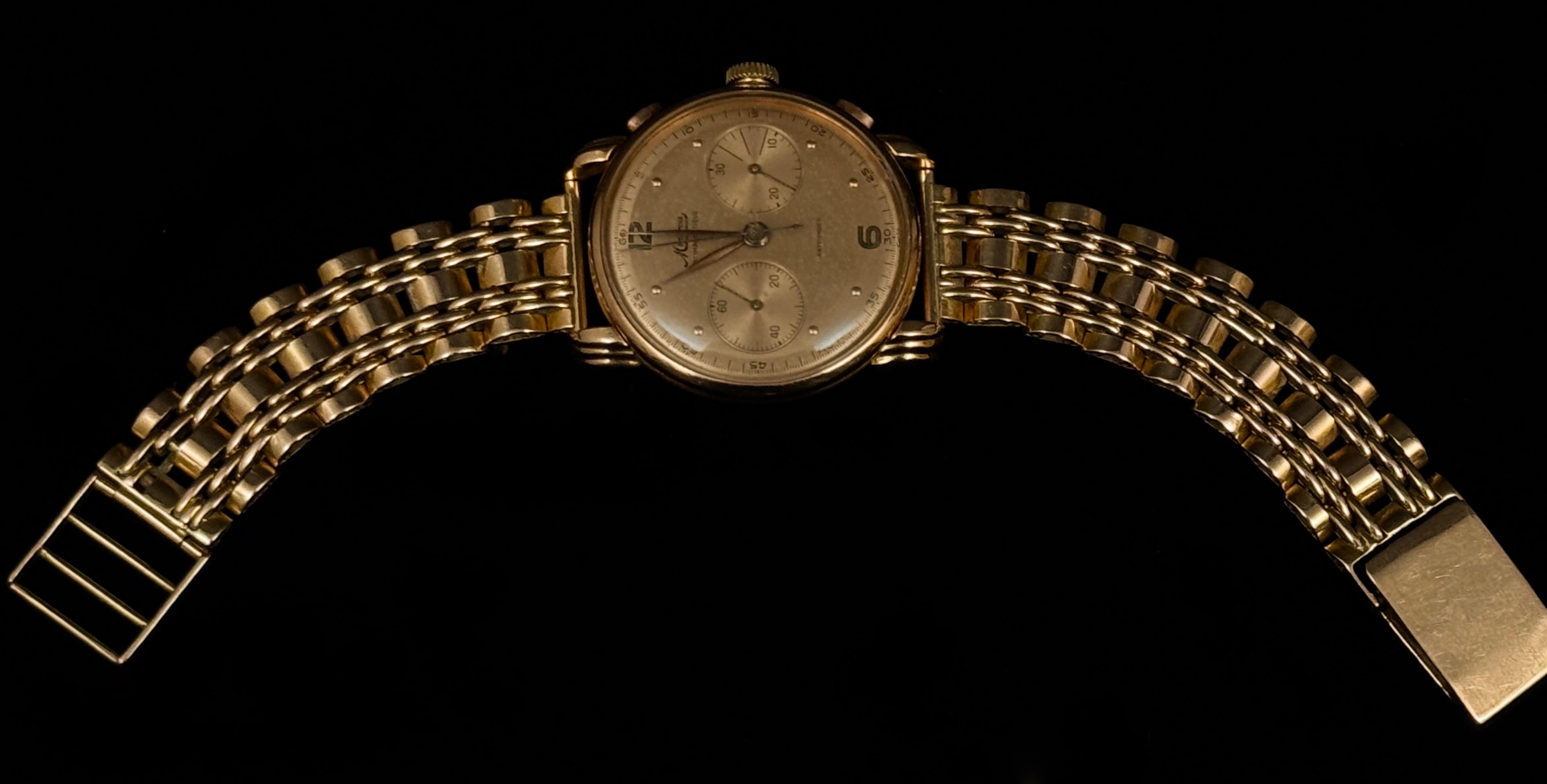 Złoty zegarek ze złotą bransoletą 18 K, ''Minerva'', masa łączna 69 g, Robert Freres Villeret Depose