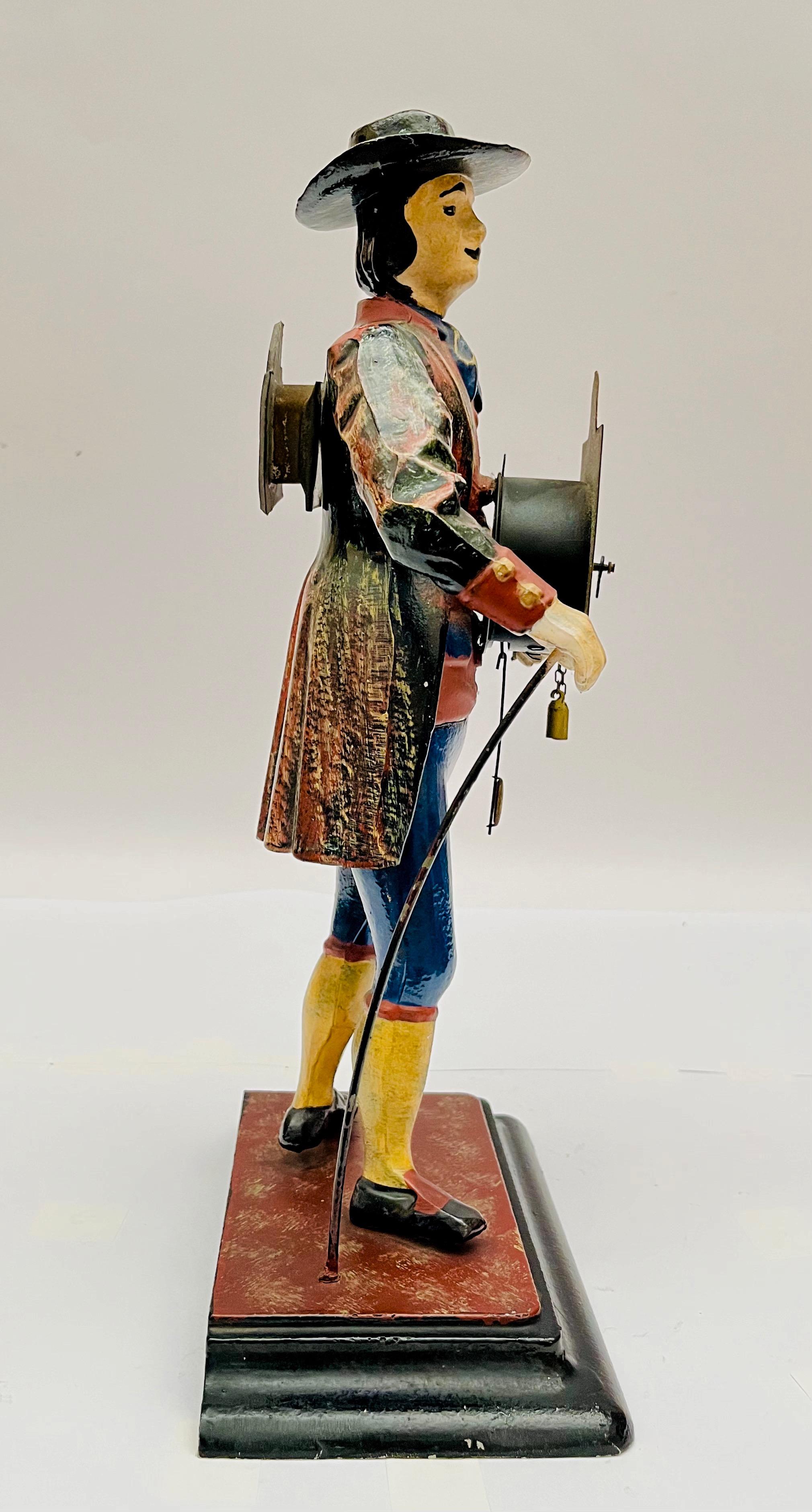 Figura ''Sprzedawca zegarów''