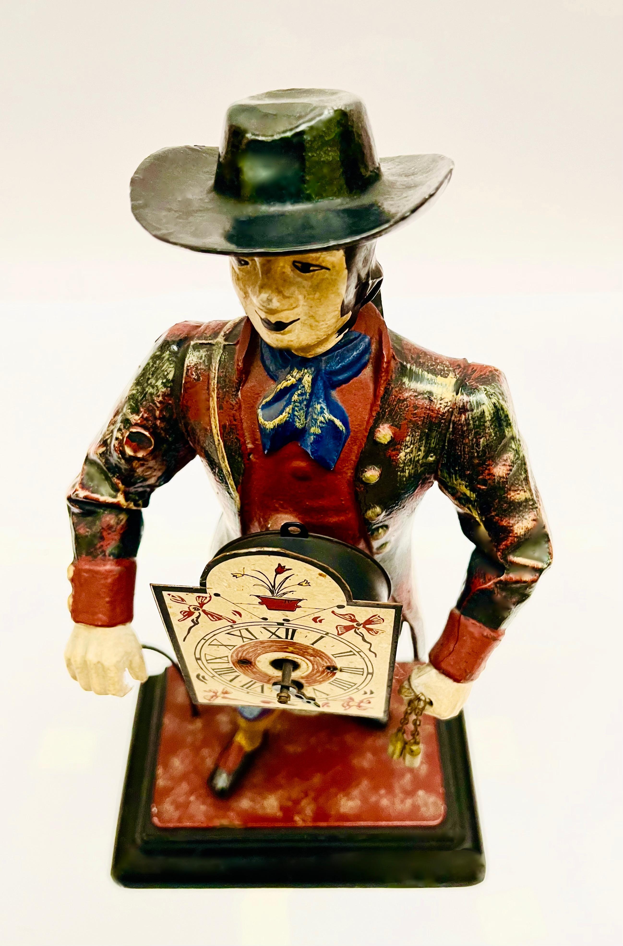 Figura ''Sprzedawca zegarów''