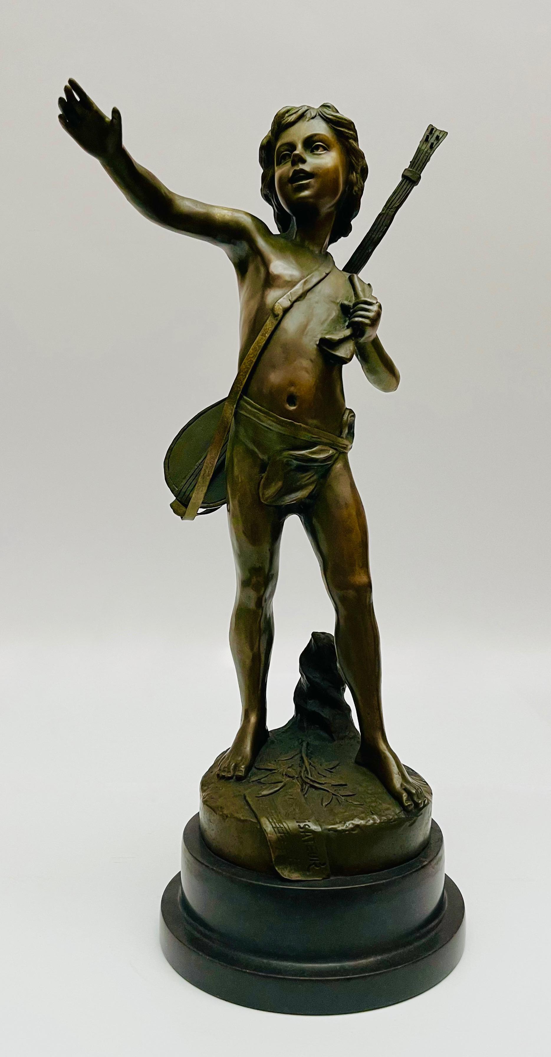 Figura chłopca z gitarą