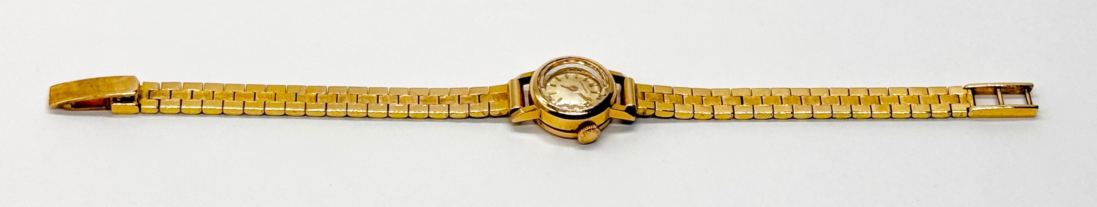 Złoty zegarek Longines ze złotą bransoletą, masa łączna 24 g