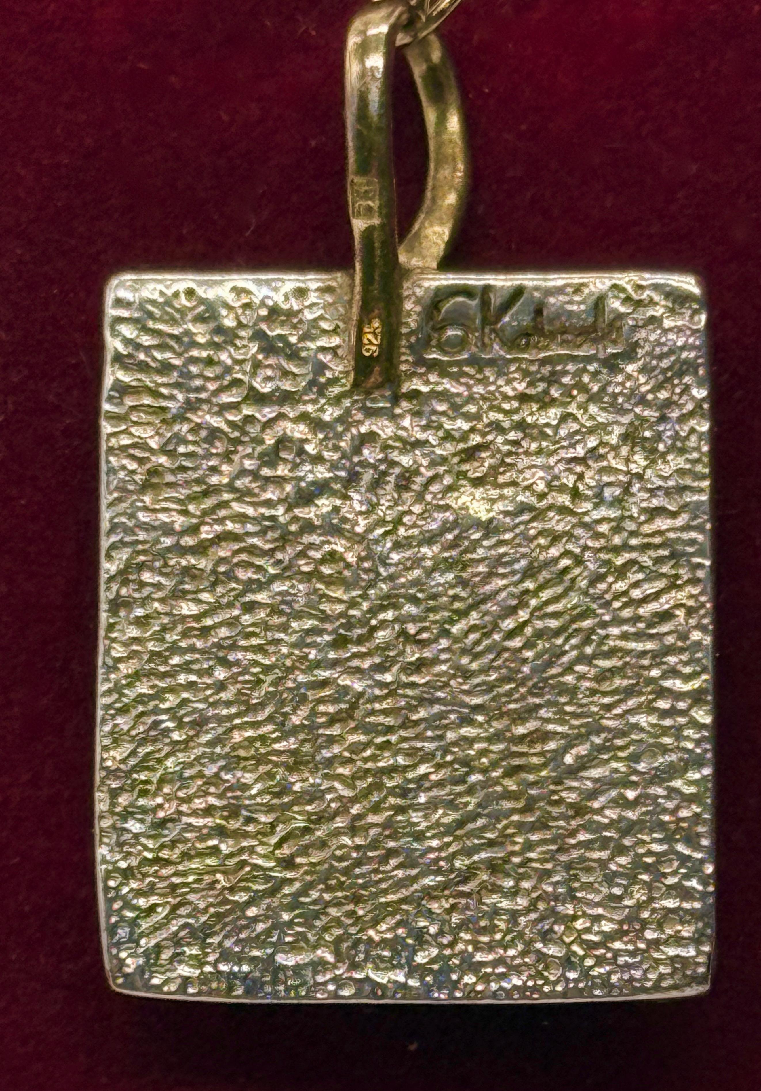 German Kabirski, Srebrny wisior