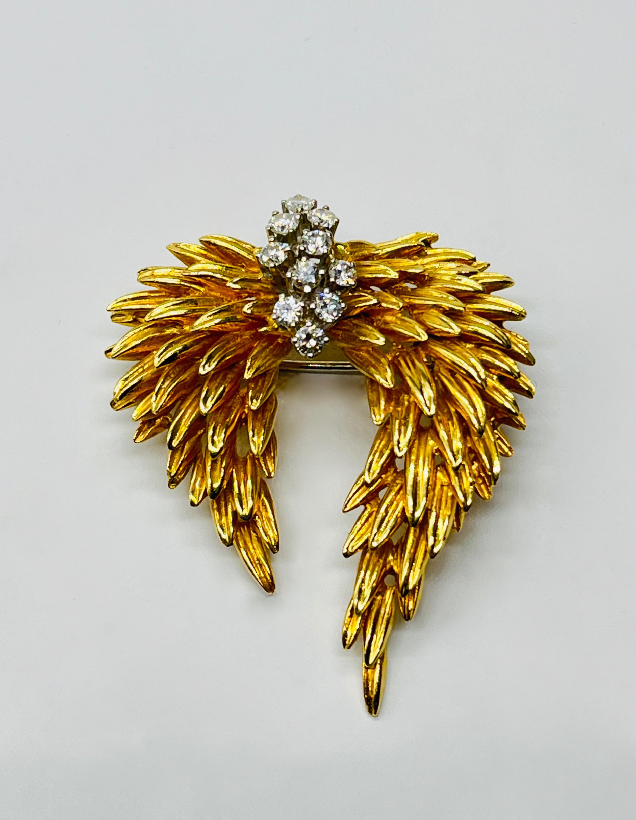 Złota brosza z diamentami