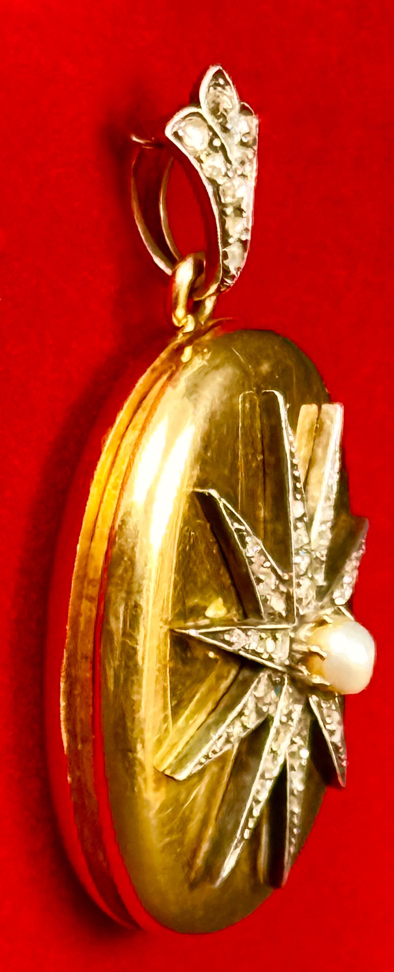 Zabytkowy złoty owalny wisior, zdobiony gwiazdą z diamentami w szlifie rozetowym i perłą, Francja XIX w.