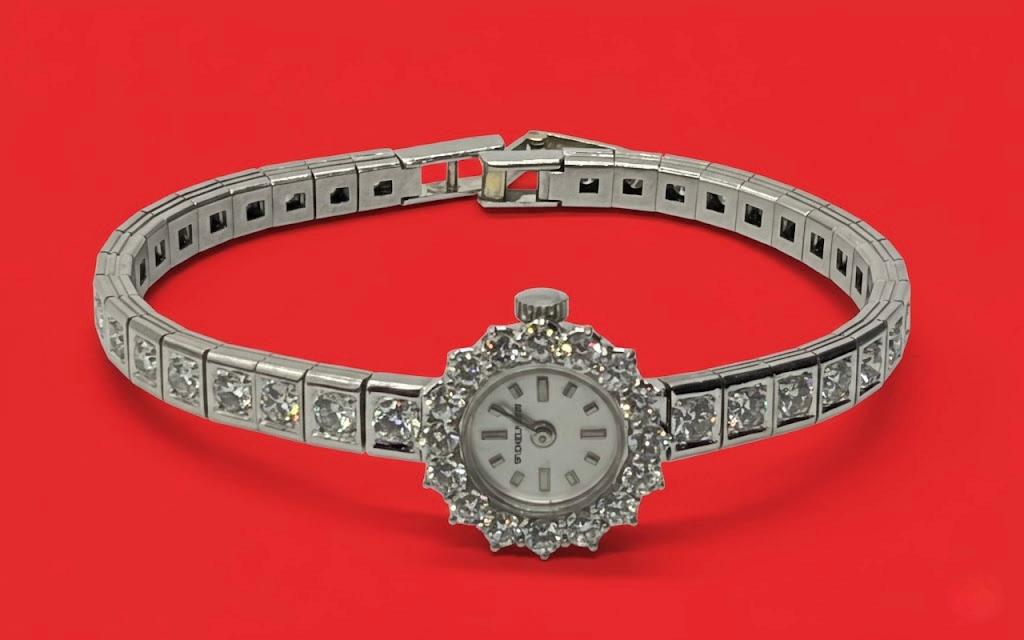 Złoty zegarek zdobiony diamentami  4,51 ct, ekspertyza