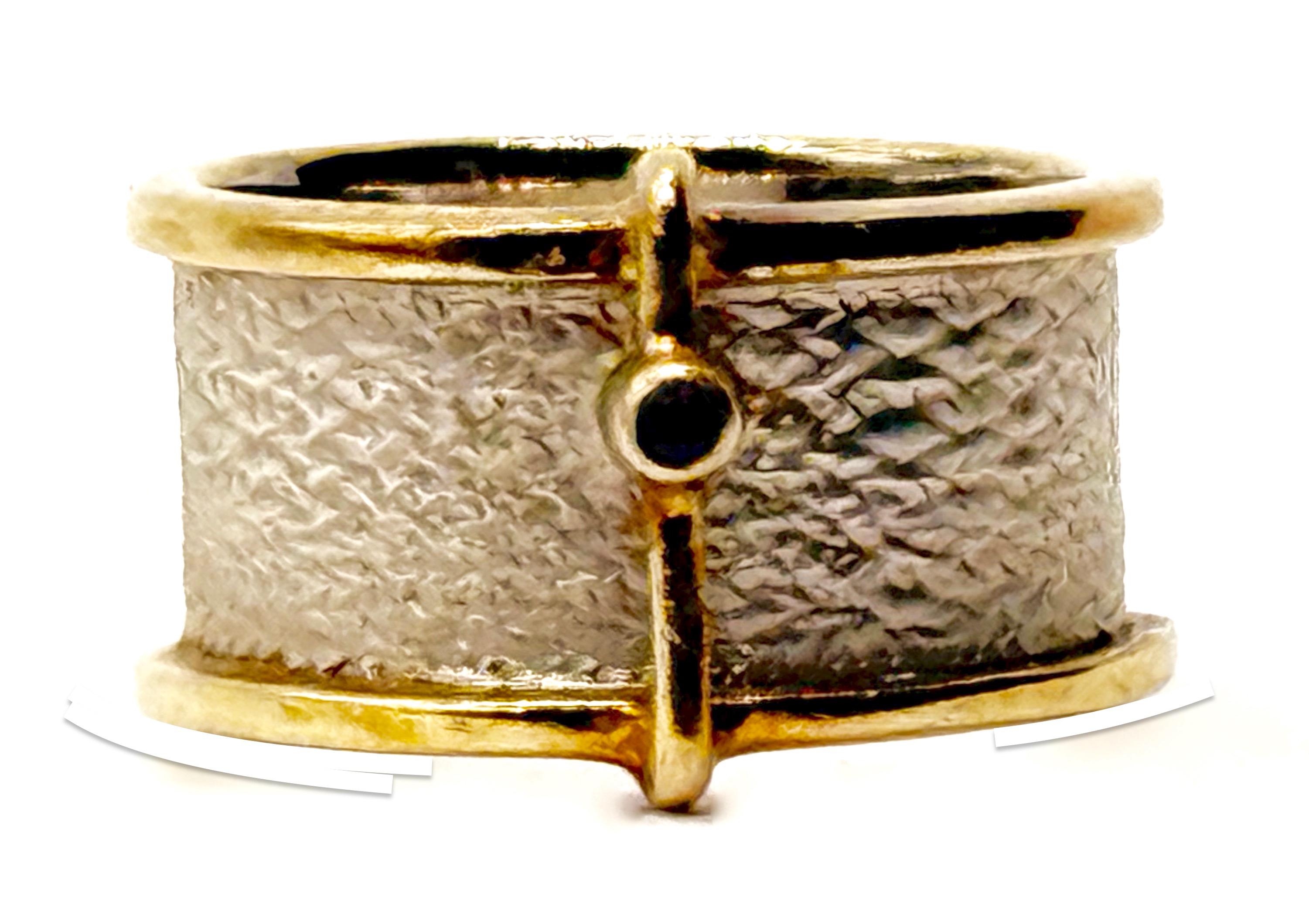 German Kabirski , srebrny pierścionek z szafirem