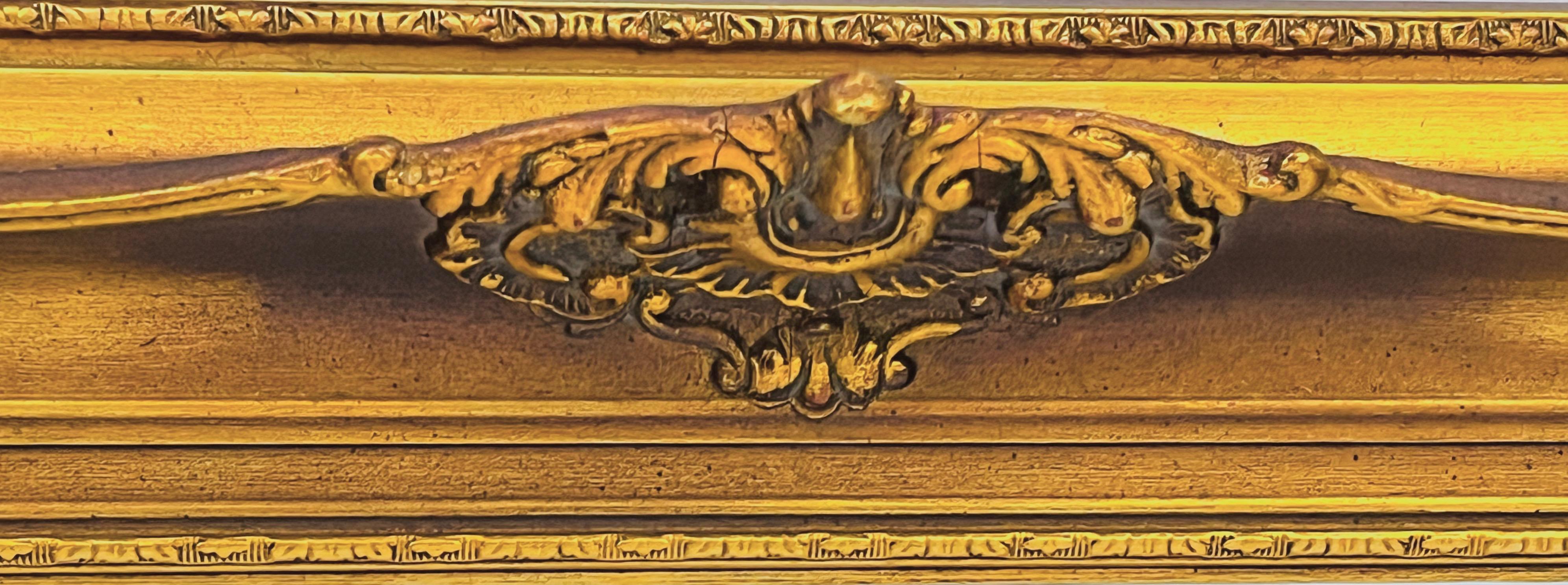 Lustro salonowe w ozdobnej złoconej ramie