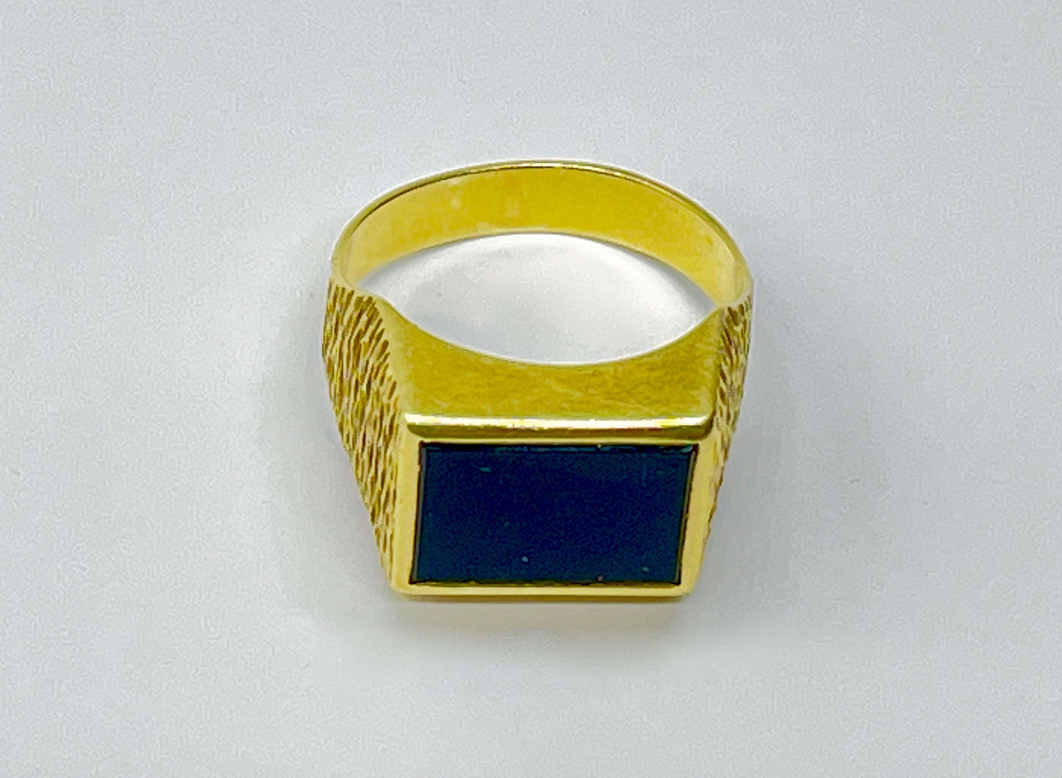 Złoty sygnet z onyksem 7,8 g