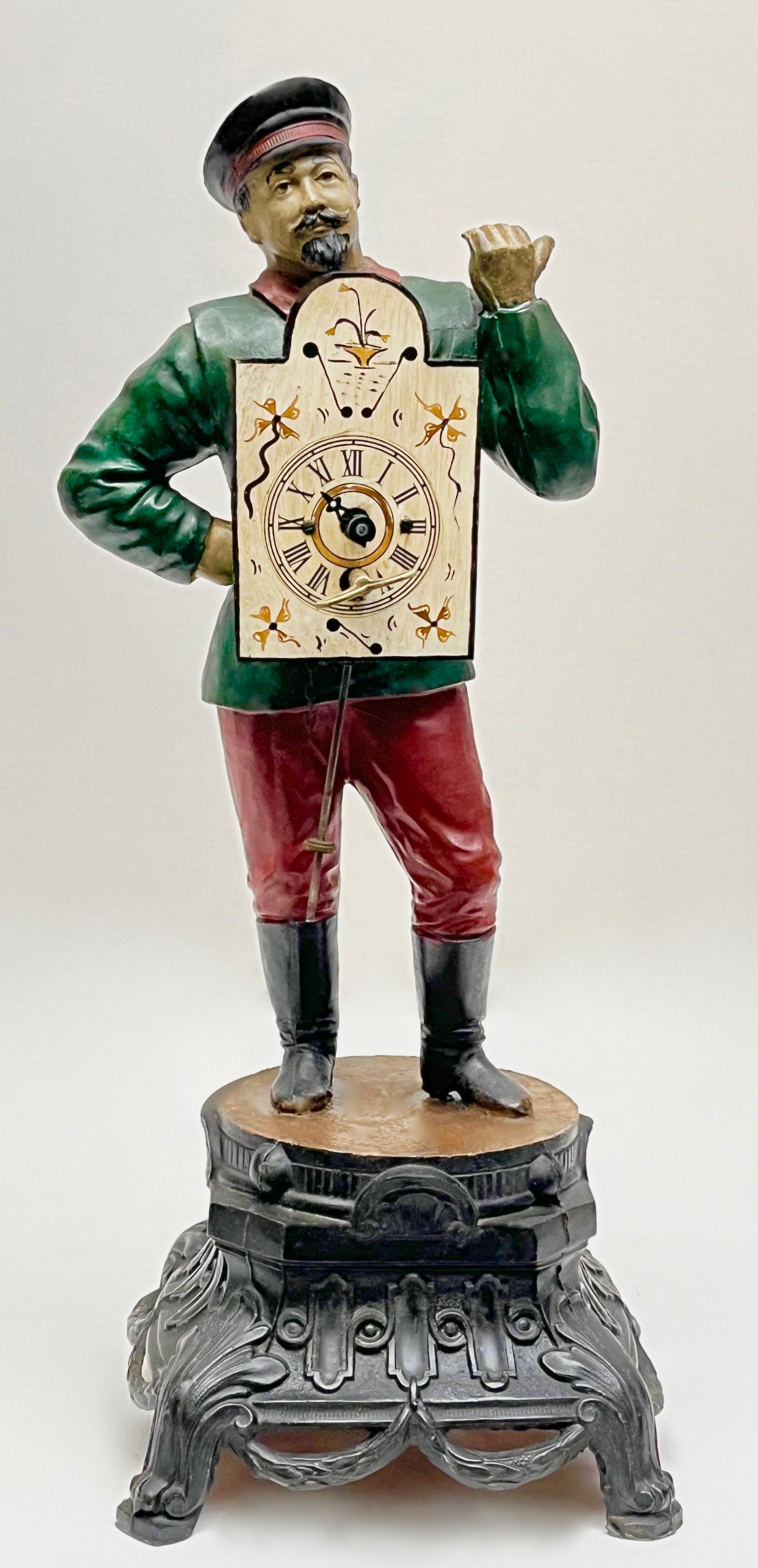 Dekoracyjna figura wędrownego sprzedawcy zegarów