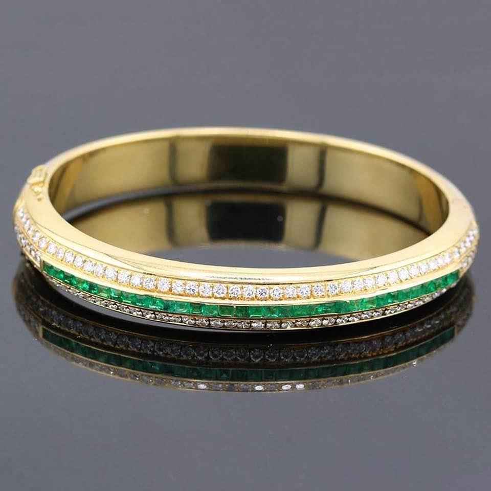 Złota bransoleta 18 k z diamentami i szmaragdami , masa łączna 53,29 g