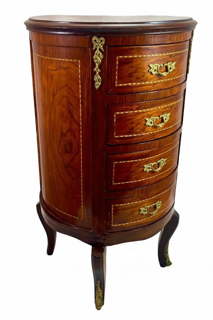Okrągła komoda w stylu Ludwika XVI stojąca na 4 giętych nogach