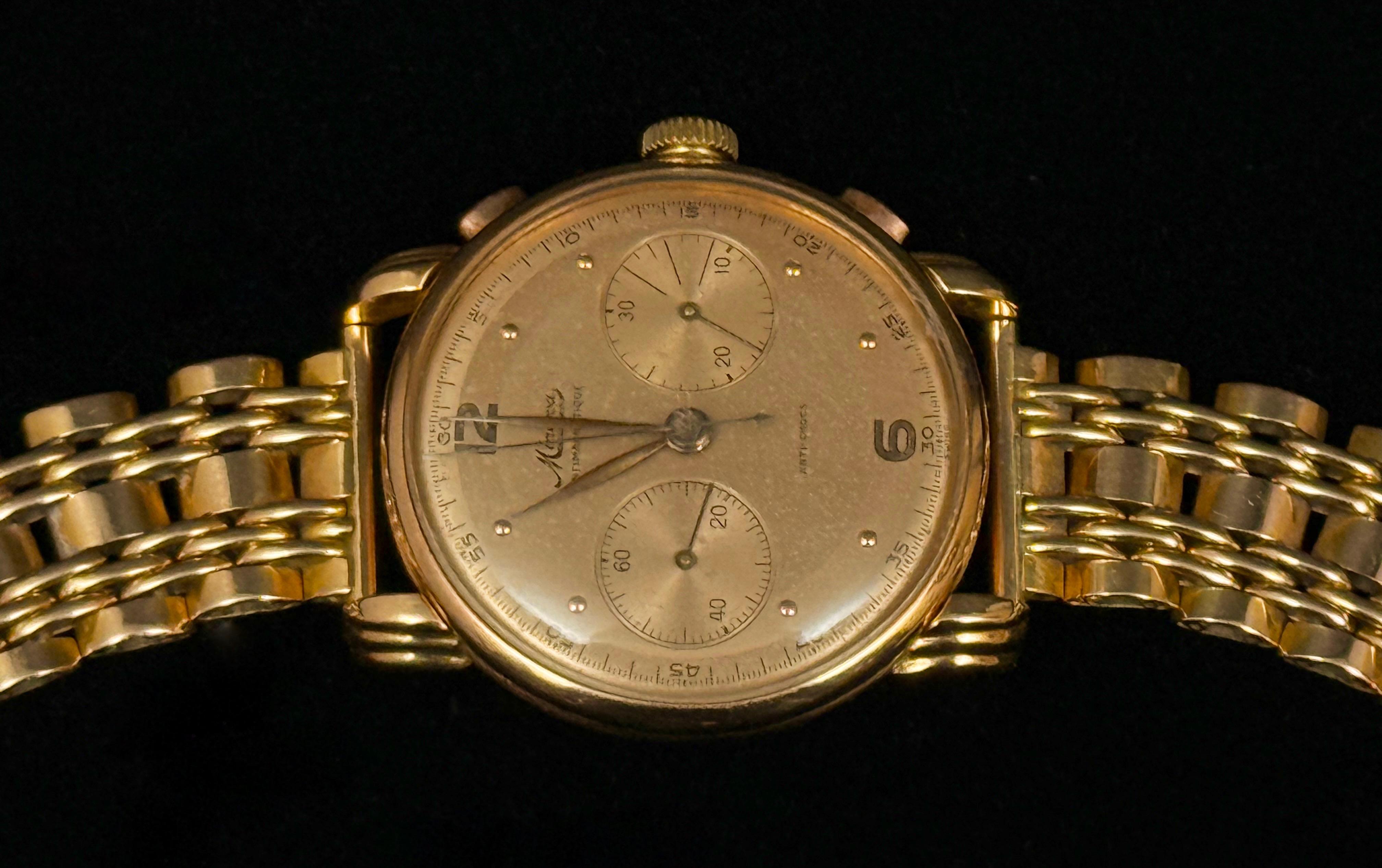 Złoty zegarek ze złotą bransoletą 18 K, ''Minerva'', masa łączna 69 g, Robert Freres Villeret Depose