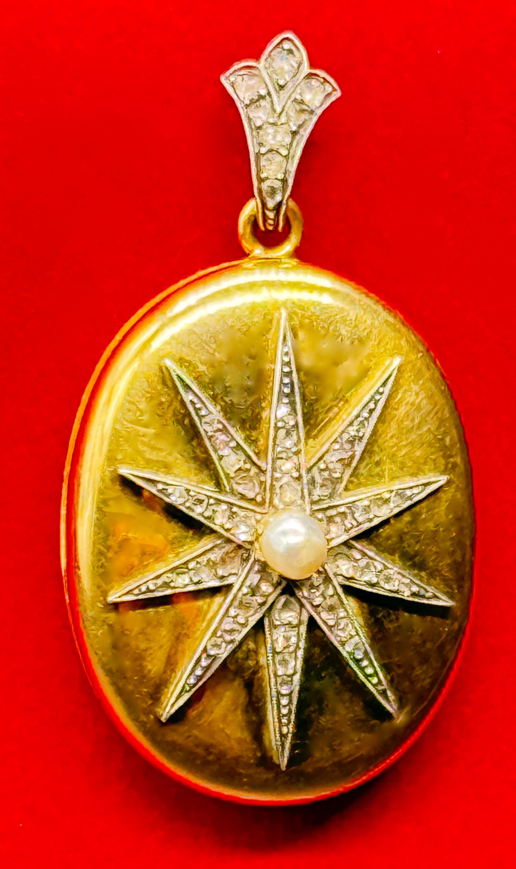 Zabytkowy złoty owalny wisior, zdobiony gwiazdą z diamentami w szlifie rozetowym i perłą, Francja XIX w.