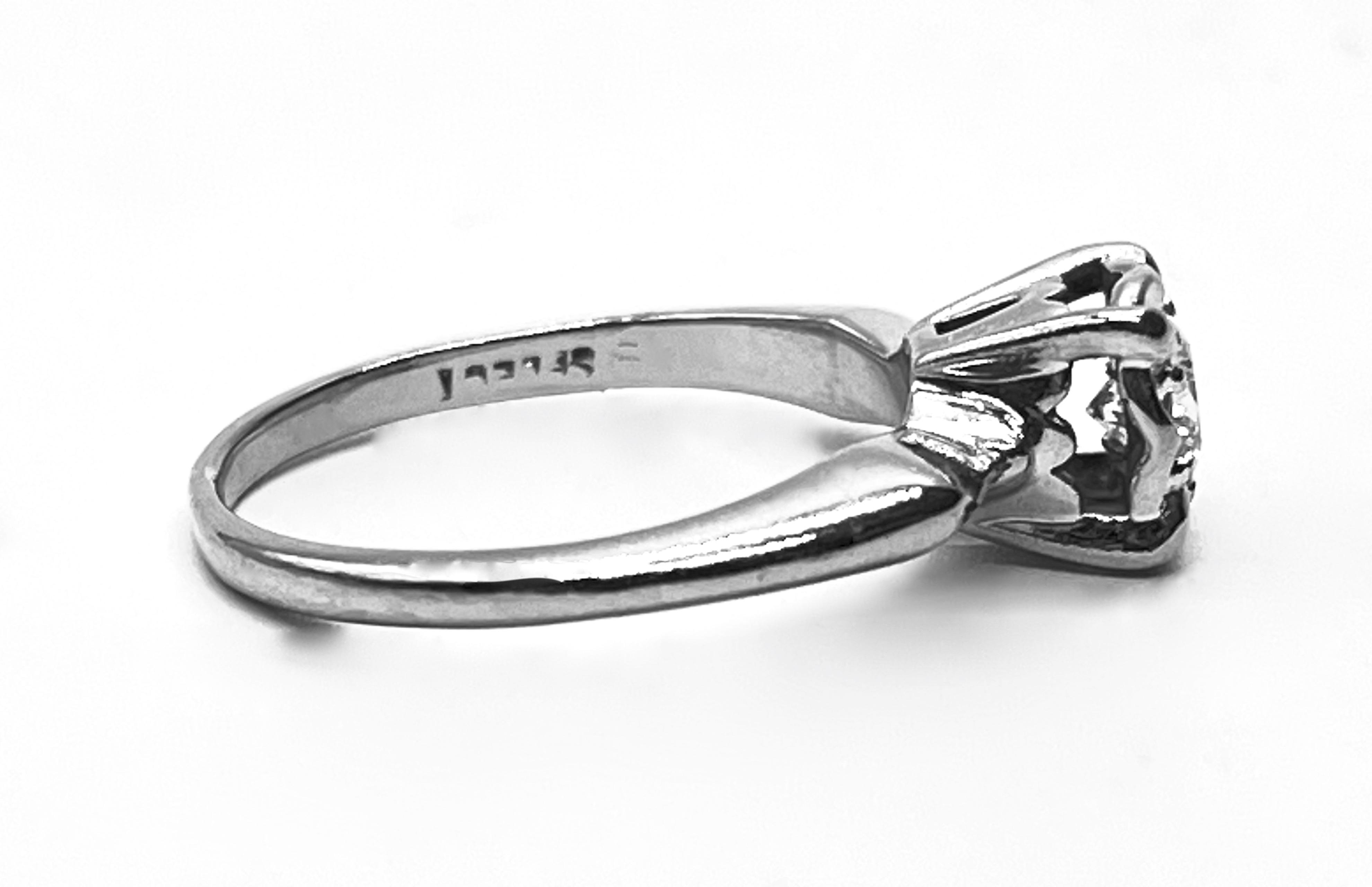 Złoty pierścionek z brylantem 0,27 ct