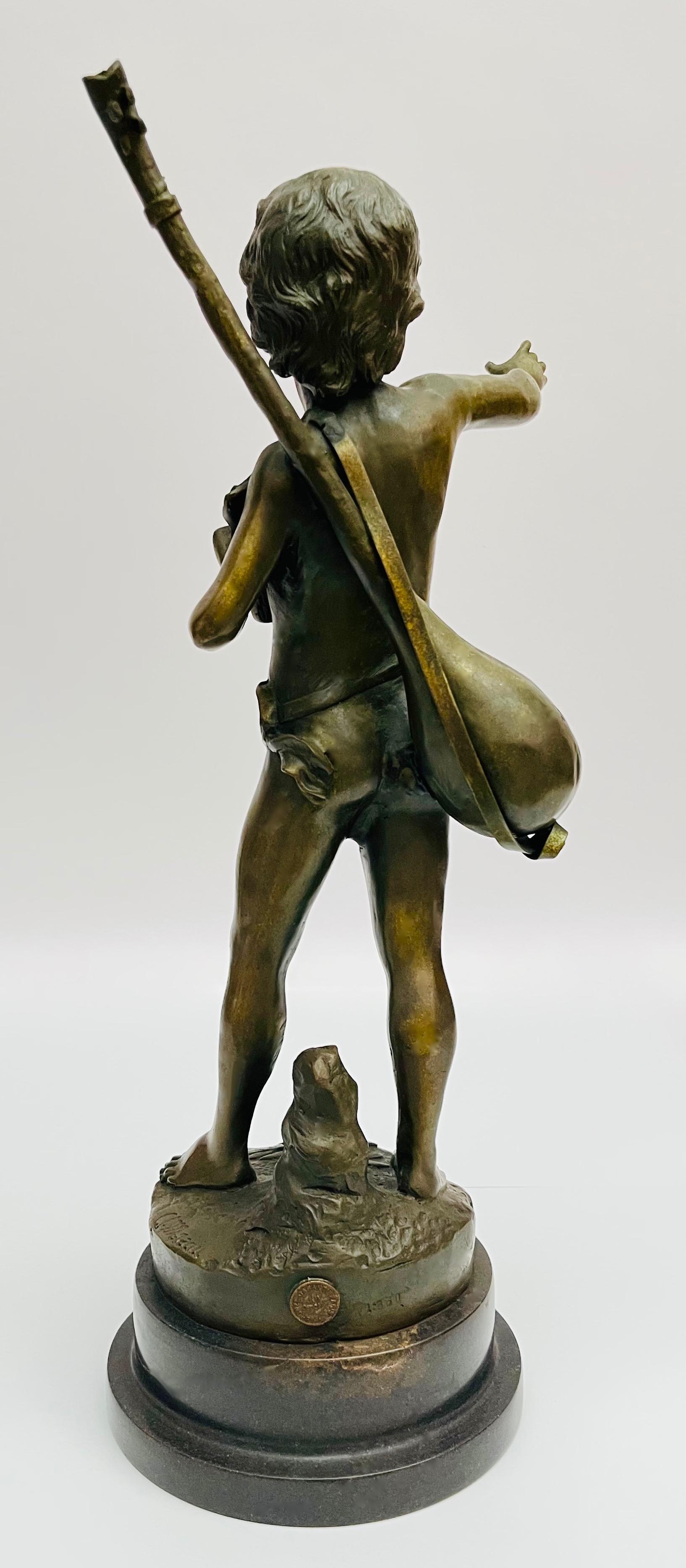 Figura chłopca z gitarą