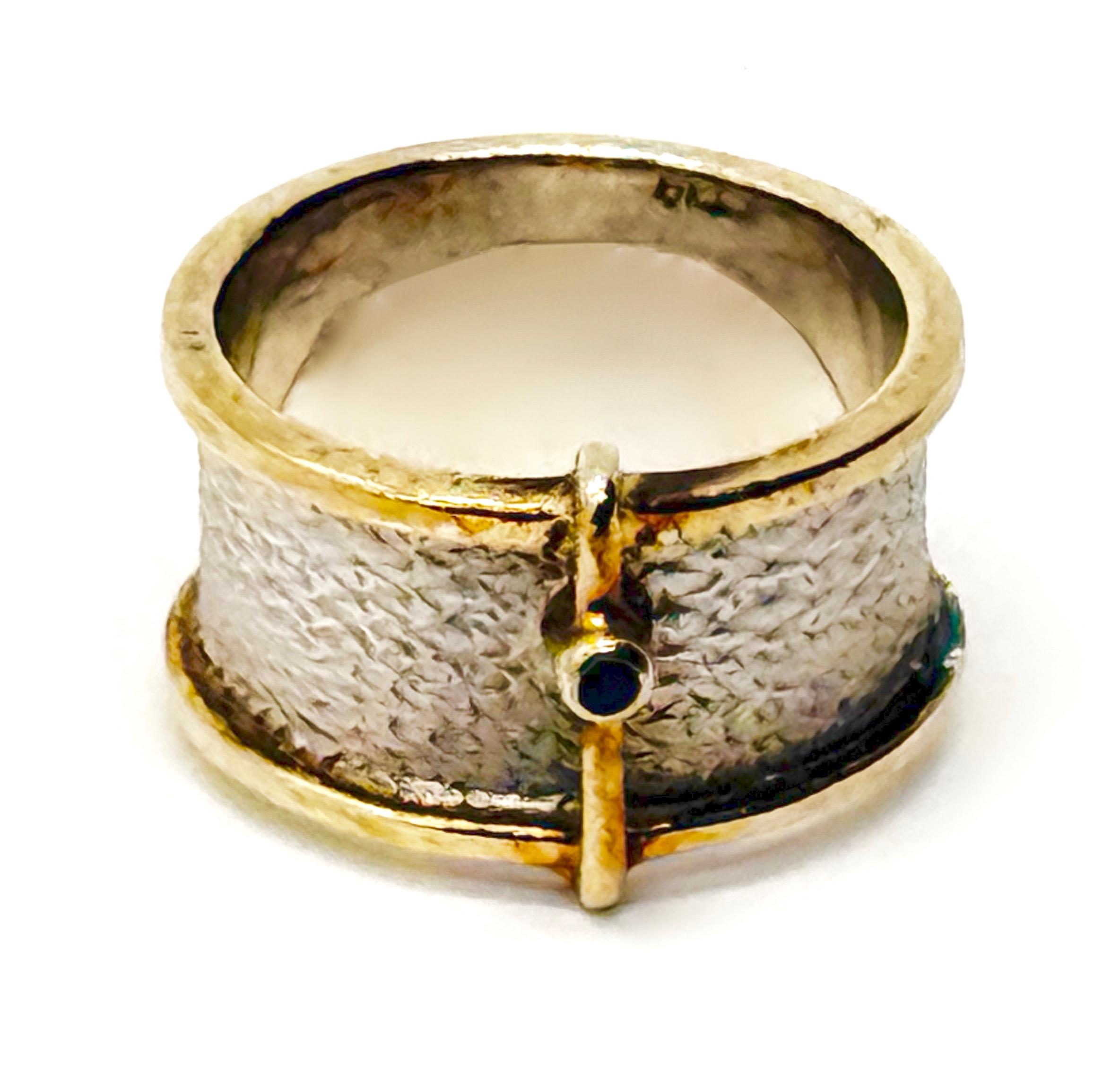 German Kabirski , srebrny pierścionek z szafirem