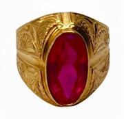 Złoty pierścionek zdobiony syntetycznym rubinem, masa łączna 6,5 g