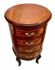 Okrągła komoda w stylu Ludwika XVI stojąca na 4 giętych nogach