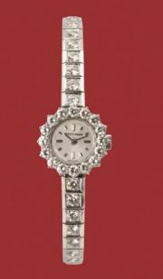 Złoty zegarek zdobiony diamentami  4,51 ct, ekspertyza