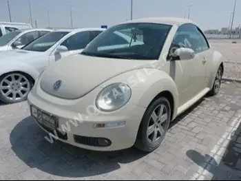 Volkswagen  Beetle  2007  Automatic  85,000 Km  4 Cylinder  Rear Wheel Drive (RWD)  Hatchback  Beige  With Warranty