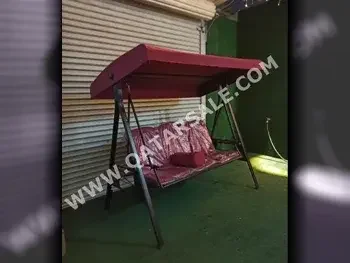 كراسي متأرجحة أحمر