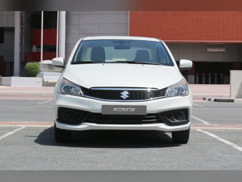 Suzuki  Ciaz  4 Cylinder  Sedan  White  2023