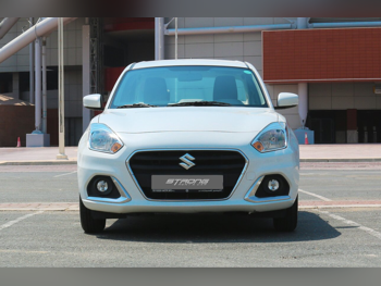 سوزوكي  دي زاير  سيدان  أبيض  2023