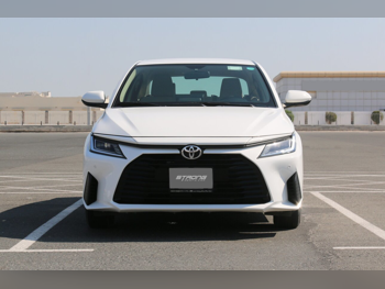 Toyota  Yaris  4 Cylinder  Sedan  White  2023