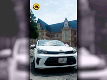 Kia  Pegas  4 Cylinder  Sedan  White  2019