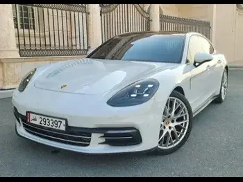 Porsche  Panamera  2018  Automatic  75,000 Km  6 Cylinder  All Wheel Drive (AWD)  Sedan  White  With Warranty