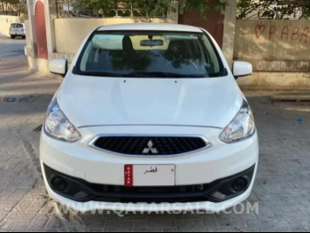 Mitsubishi  Mirage  4 Cylinder  Hatchback  White  2024
