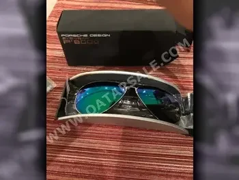 بورشه ديزاين  نظارة شمسية  اللون الرمادي  طيار  رؤيا واحدة  ألمانيا  ضمان  رجالي