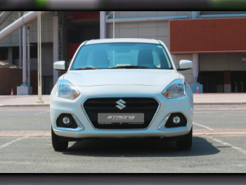 سوزوكي  دي زاير  4 سلندر  سيدان  أبيض  2024