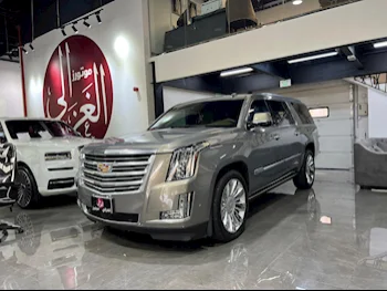  Cadillac  Escalade  Platinum  2018  Automatic  150,000 Km  8 Cylinder  Four Wheel Drive (4WD)  SUV  Brown  With Warranty