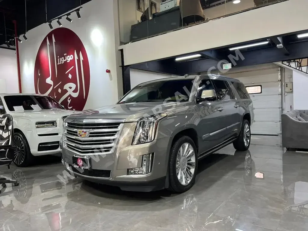 Cadillac  Escalade  Platinum  2018  Automatic  150,000 Km  8 Cylinder  Four Wheel Drive (4WD)  SUV  Brown  With Warranty