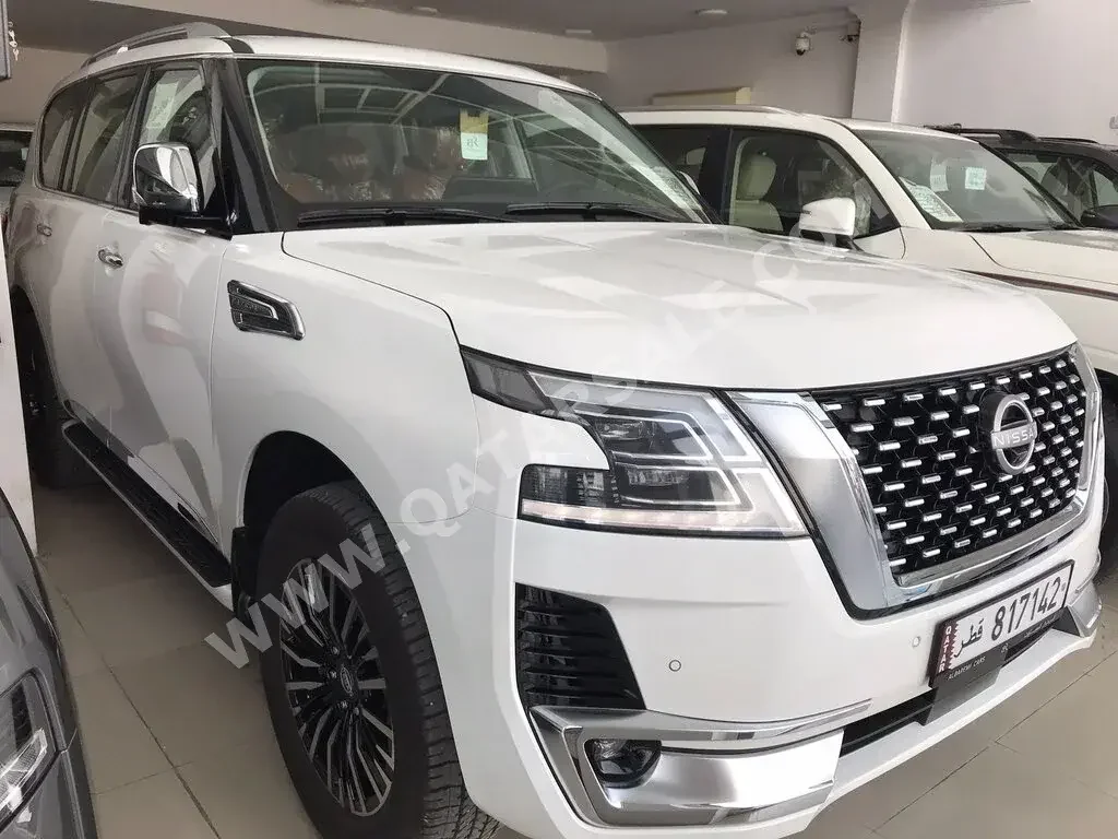  Nissan  Patrol  Platinum  2023  Automatic  0 Km  6 Cylinder  Four Wheel Drive (4WD)  SUV  White  With Warranty