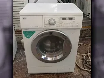 ال جي \  غسالة تحميل أمامي  أبيض