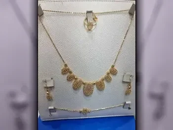 Gold Without Stone  Woman  Set  By Weight  Bahrain  18.7 Gram  Yellow Gold  21k