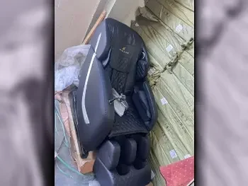 أجهزة التدليك كرسي تدليك  أسود