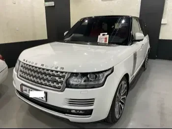 Land Rover  Range Rover  Vogue SE Super charged  2014  Automatic  239,000 Km  8 Cylinder  Four Wheel Drive (4WD)  SUV  White  With Warranty