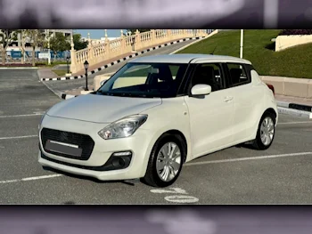 Suzuki  Swift  4 Cylinder  Sedan  White  2020