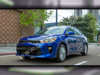 Kia  Rio  4 Cylinder  Sedan  White  2023