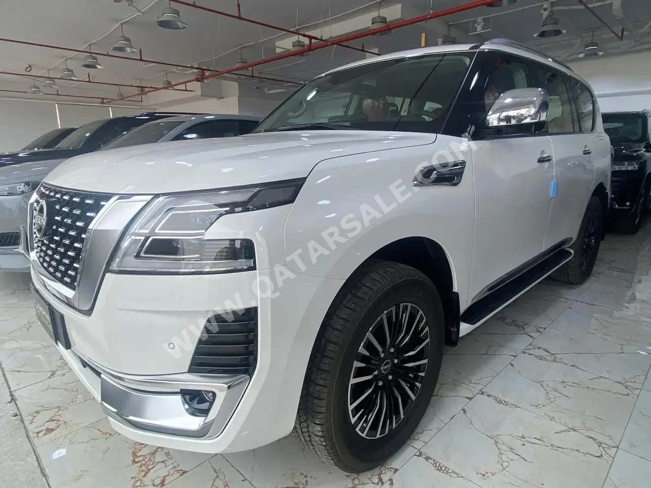 Nissan  Patrol  Platinum  2023  Automatic  0 Km  6 Cylinder  Four Wheel Drive (4WD)  SUV  White  With Warranty