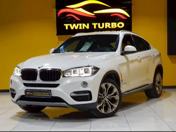  BMW  X-Series  X6  2018  Automatic  150,000 Km  6 Cylinder  Four Wheel Drive (4WD)  SUV  White  With Warranty