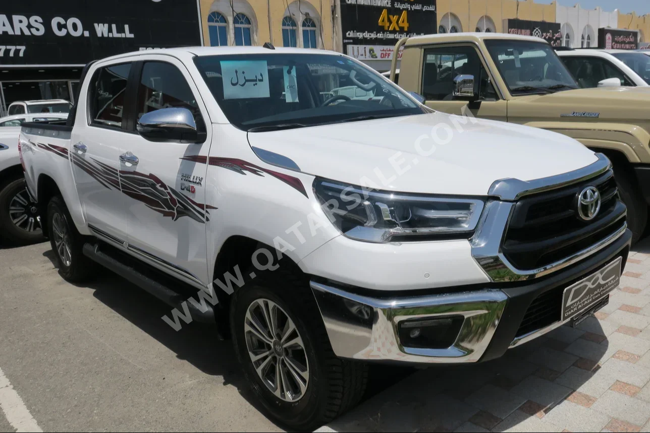 Toyota  Hilux  2024  Automatic  0 Km  4 Cylinder  Four Wheel Drive (4WD)  Pick Up  White