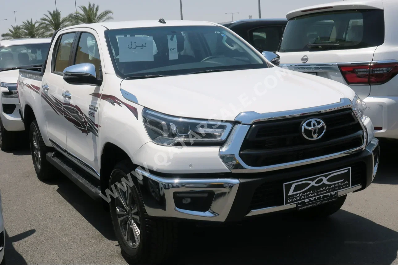 Toyota  Hilux  2024  Automatic  0 Km  4 Cylinder  Four Wheel Drive (4WD)  Pick Up  White  With Warranty
