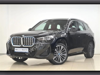 BMW  IX  1  2023  Automatic  7,960 Km  0 Cylinder  All Wheel Drive (AWD)  SUV  Black  With Warranty